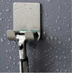 Merkloos Luxe RVS Scheermeshouder - 1 Stuk - Zelfklevende Scheermeshouder - Badkamer Scheermes Houder - Handdoek Houder - Badkamerhaak - Wandhaak - Zelfklevende Haak - Haakje - Douche - Toilet - Keuken - Kabelhouder - Organizer - Haak Voor Scheermes - Wc Haak